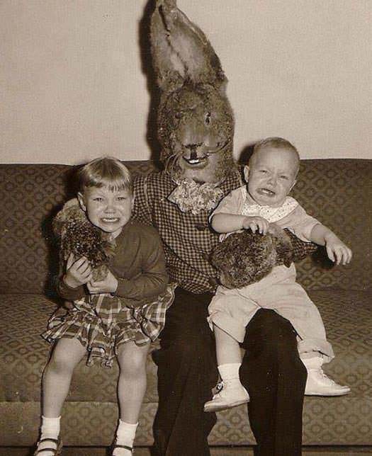 A man in an Easter bunny costume scares 2 children in the US in 1958.