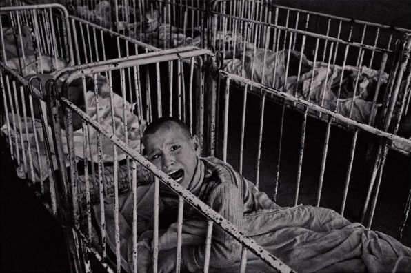 A child in an orphanage for "incurables" in Romania in 1990.