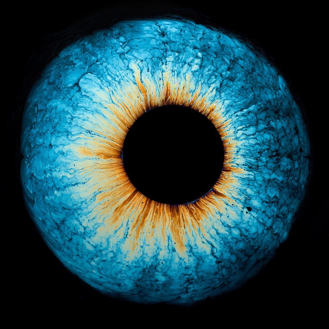 This isn’t an eye. It’s a drop of petrol in water.