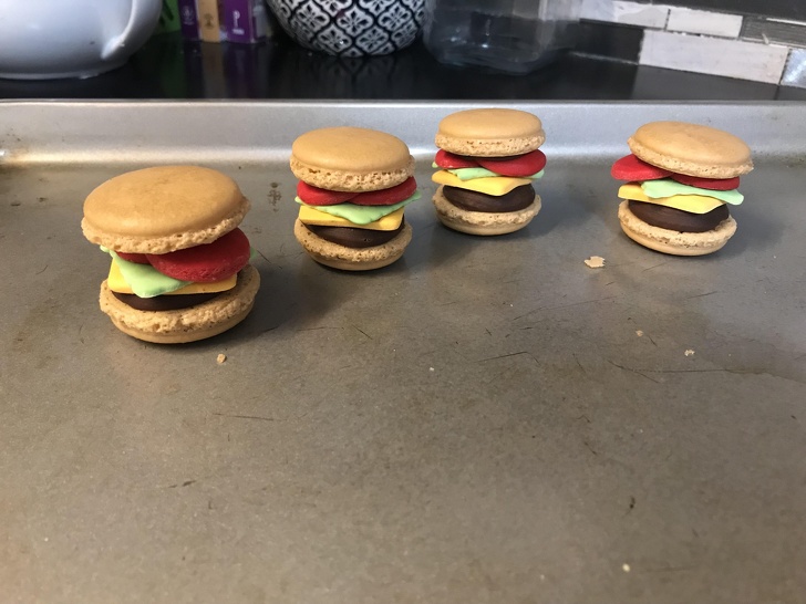 “Yesterday I told my friend that her macarons looked like little hamburgers. Tonight she sent me this.”