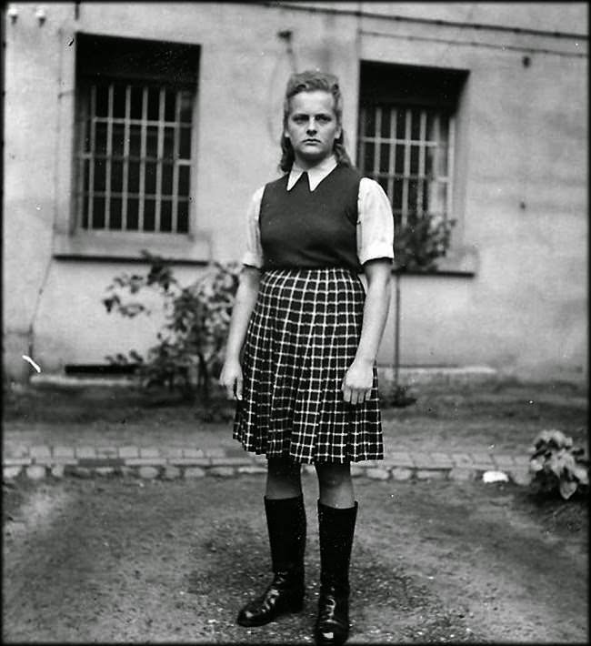 22 Year old SS guard of the Auschwitz concentration camp Irma Ilse defiantly poses for a picture after her capture in 1945. She was also the warden of the womens section of the Bergen-Belsen concentration camp. Many said she had the face of pure evil and showed zero remorse for her crimes which included executions, assisting with Nazi experiments, torture, beatings, and much more. Originally she wanted to be a nurse, but she failed all her tests. She became infatuated with the Nazi's and volunteered for SS guard duty. She went from wanting to try to save people to killing them. She would be hung for war crimes later that year.