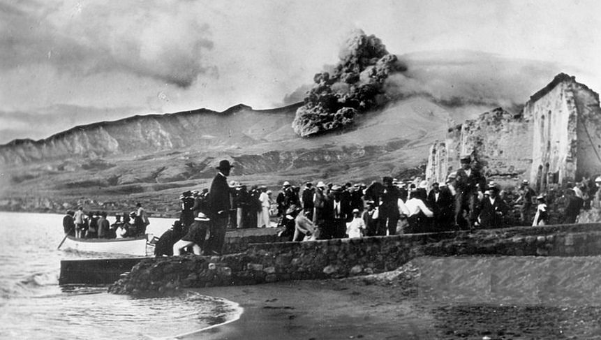 People board the last few ships available as the volcanic cloud moves towards them during an early eruption of Mount Pelée on the island of Martinique in 1902. Anyone unable to get off the island went to the city of Sait-Pierre. The city was flooded with too many refugees fleeing other parts of the island as smaller eruptions had already begun. These people had no other place to go at this time. Before a major plan could commence to potentially evacuate Sait-Pierre of its large population, the main eruption hit the city and it hit hard and fast. The eruption quickly engulfed the entire city of Sait-Pierre, killing virtually all the 30,000 people in the city at the time. Apparently only 2 people survived. The people had no chance, and this was the 3rd worst death toll from a volcano in recorded history.