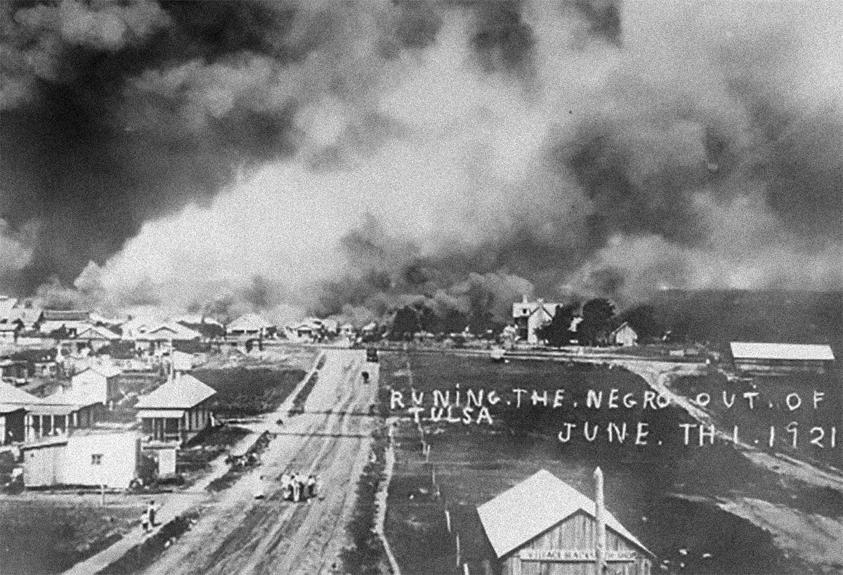 A picture of the black residential area of Tulsa on fire during the Tulsa Race Riot in Oklahoma, US in 1921. The cause of the riot started when a young 19 black man Dick Rowland was accused of assaulting a 17 year old white woman, Sarah Page. Using the word assault when described against a women in 1921 was also the term for rape. Despite no real evidence with even the young girl not making such a claim nor trying to press charges, Dick Rowland was detained and taken to the court house. Soon after a lynch mob developed. The sheriff of Tulsa did a terrific job not letting the mob get the young man, who survived the ordeal. White officers put their own lives on the line in a racially segregated South prepared to gun down intruders to avoid a lynching of a young black man. It worked, however it had terrible unknown consequences. Fearful of the lynch mob succeeding, black community members armed themselves. They kept offering to help the officers but knowing what a bad idea that was, the sheriff turned those offers down. Seeing armed black men, the crowd of over 2,000 white people, mostly males, armed up themselves. Eventually a small race battle ensued. For 3 days armed conflicts between whites and blacks commenced. In the process, the white mobs shot every black person they saw at times, and burned down the very wealthy black communities businesses and homes. They even used privately owned planes to recon and attack the areas with incendiary bombs. The National Guard went in to issue martial law and they were fired upon by both sides. Once everything was quelled, up to 300 people were dead, estimated around 250 or so being black, most unarmed and caught in the conflict. Most of the black community known as "Black Wall Street" was destroyed, with thousands of blacks fled the city, never returning. That note is a good reason for the words written on this picture, even though, ironically, the poor spelling is evident.
