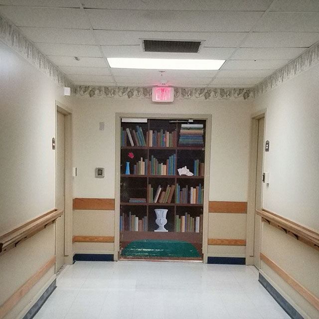 Exit Door disguised as bookcase in Alzheimers Ward