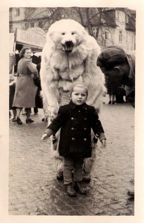 A man dressed in a bear costume in Germany in 1950.
