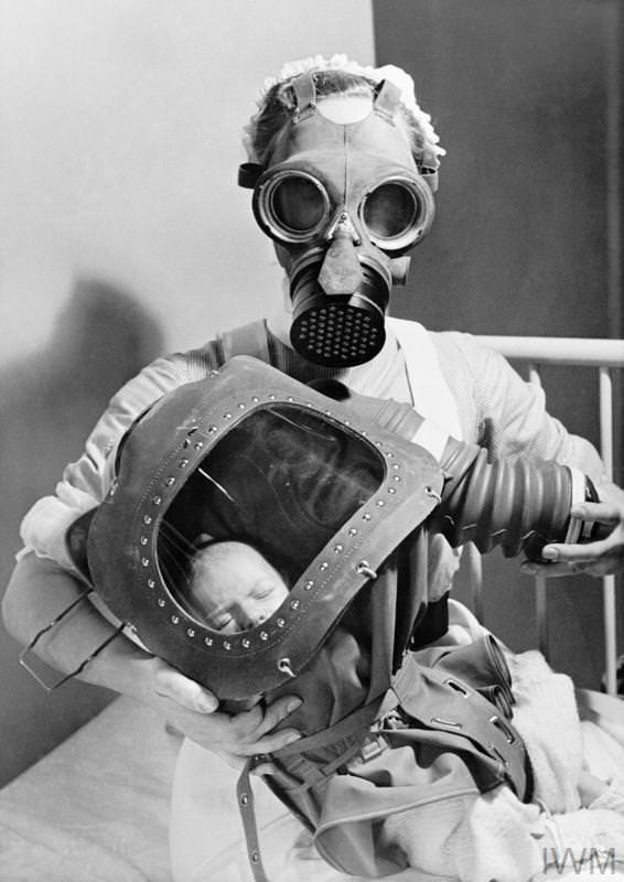 A nurse fits a child with a respirator in England in 1943.