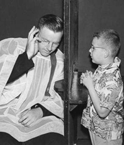 A boy confesses to a priest in Italy in 1959.