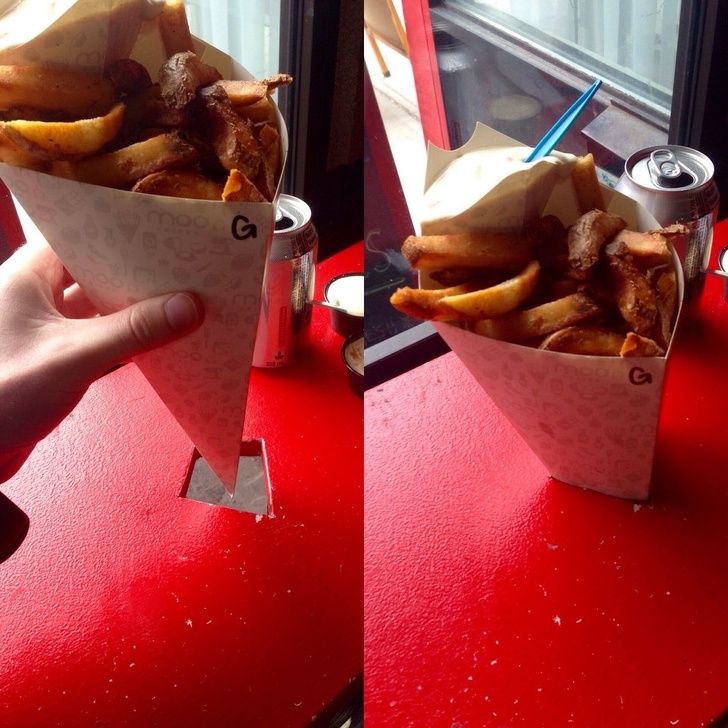 This restaurant sells fries in paper cones — and the tables have diamond-shaped holes that hold the сones.