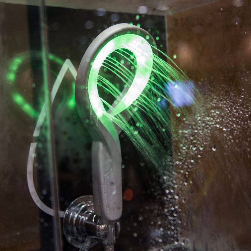 A shower with LED lights that change colors (from green to blue to purple to red) based on the amount of time spent showering. Its purpose is to save you money on your water bill.