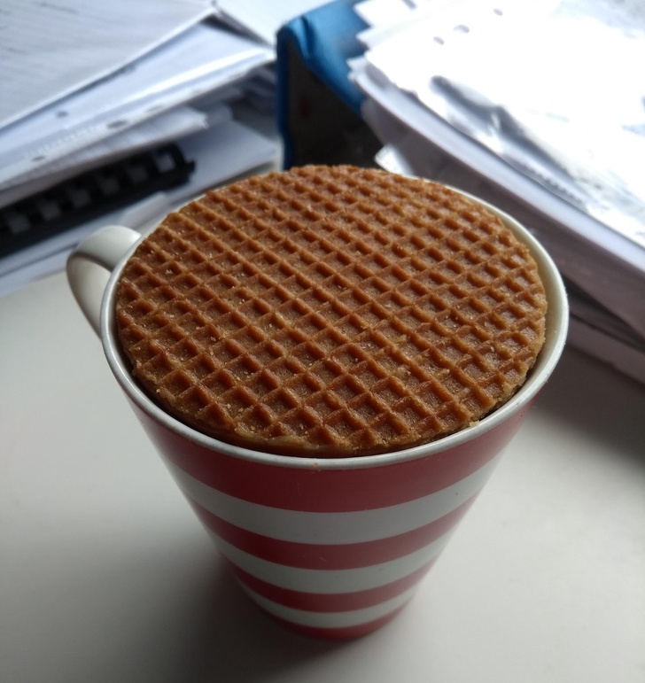 This stroopwafel is just the right size to be heated by the hot coffee underneath.