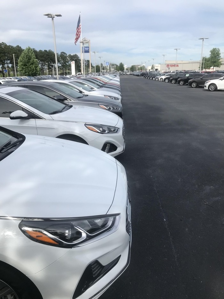 A car dealership where only professional drivers work