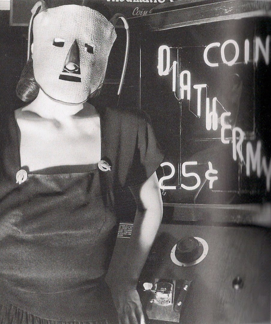 A woman wears a beauty mask in the US in 1940.