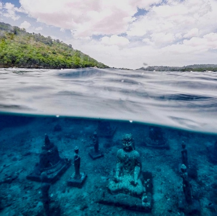 An underwater Buddha on a small island near Bali