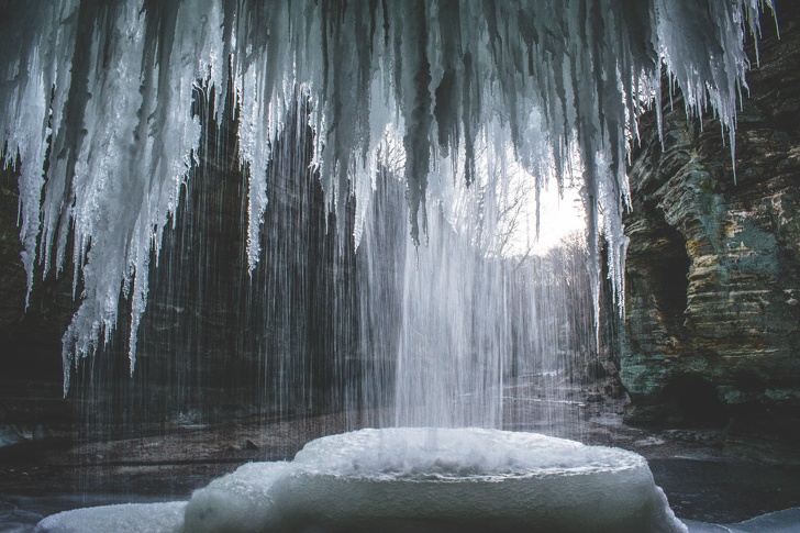 A view inside a partially frozen waterfall