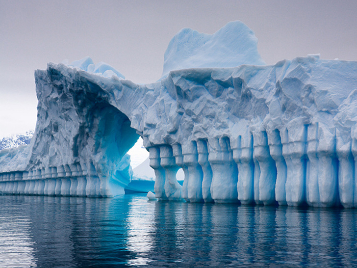A naturally formed ice shelf shaped by water