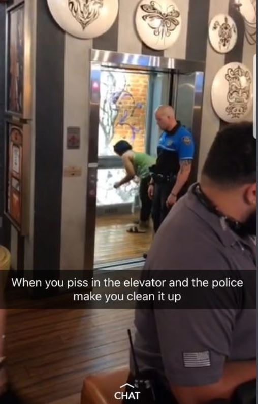 Snapchat of woman cleaning up her pee from an elevator