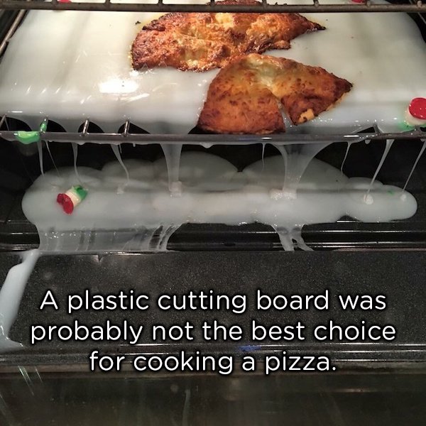 putting cutting board in oven - A plastic cutting board was probably not the best choice for cooking a pizza.