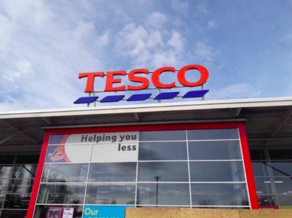 signage - Tesco Helping you less Our
