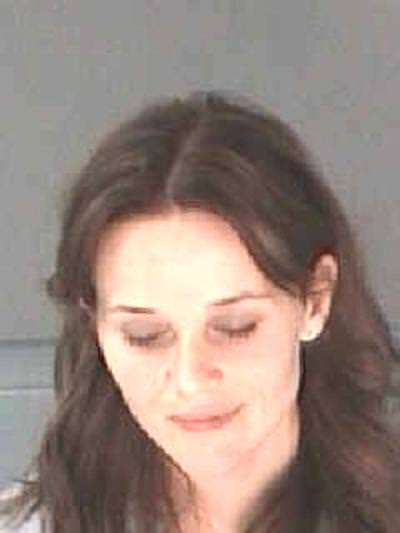 Oscar-winning actress Reese Witherspoon was arrested in April 2013 by Georgia cops and charged with disorderly conduct. After state troopers pulled over the Ford Focus being driven by her husband for alleged drunk driving, the 37-year-old Hollywood star--a passenger in the vehicle--refused to remain in the car while her husband was given field sobriety tests.

At one point police claim the “Walk the Line” star asked an officer, “Do you know my name?” She was later arrested (along with her husband who was charged with DUI) and booked into the city jail where she posed for the above Atlanta Department of Corrections mug shot.