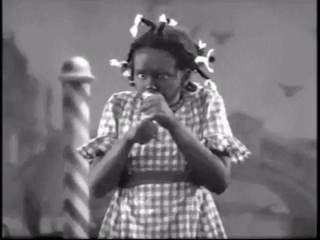 None other than Judy Garland of The Wizard of Oz fame doing blackface for the film Everybody Sing in 1938. She was 15 years old at the time.