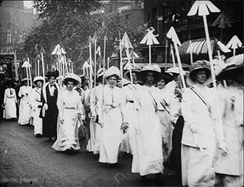 Suffragettes carrying spears during a parade for women's rights in London, England in 1910.