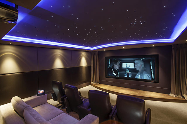 There is a group of about 400 ultra powerful and wealthy individuals that see movies on release day in their own home theaters. It costs $100k to join and $4k/month membership. It is called the Bel Air Circuit.
