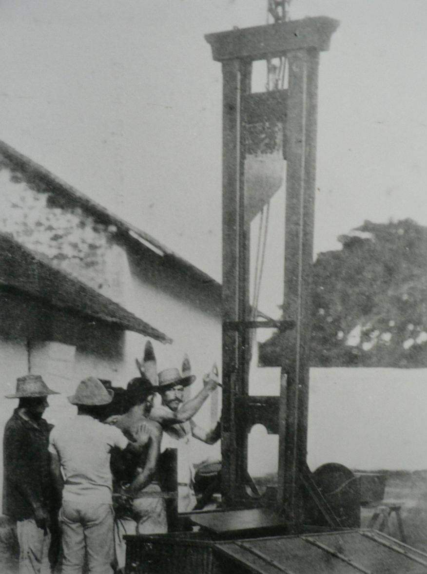 Men prepare to use the guillotine on an inmate at the Cayenne Penal Colony in French Guyana in 1925.