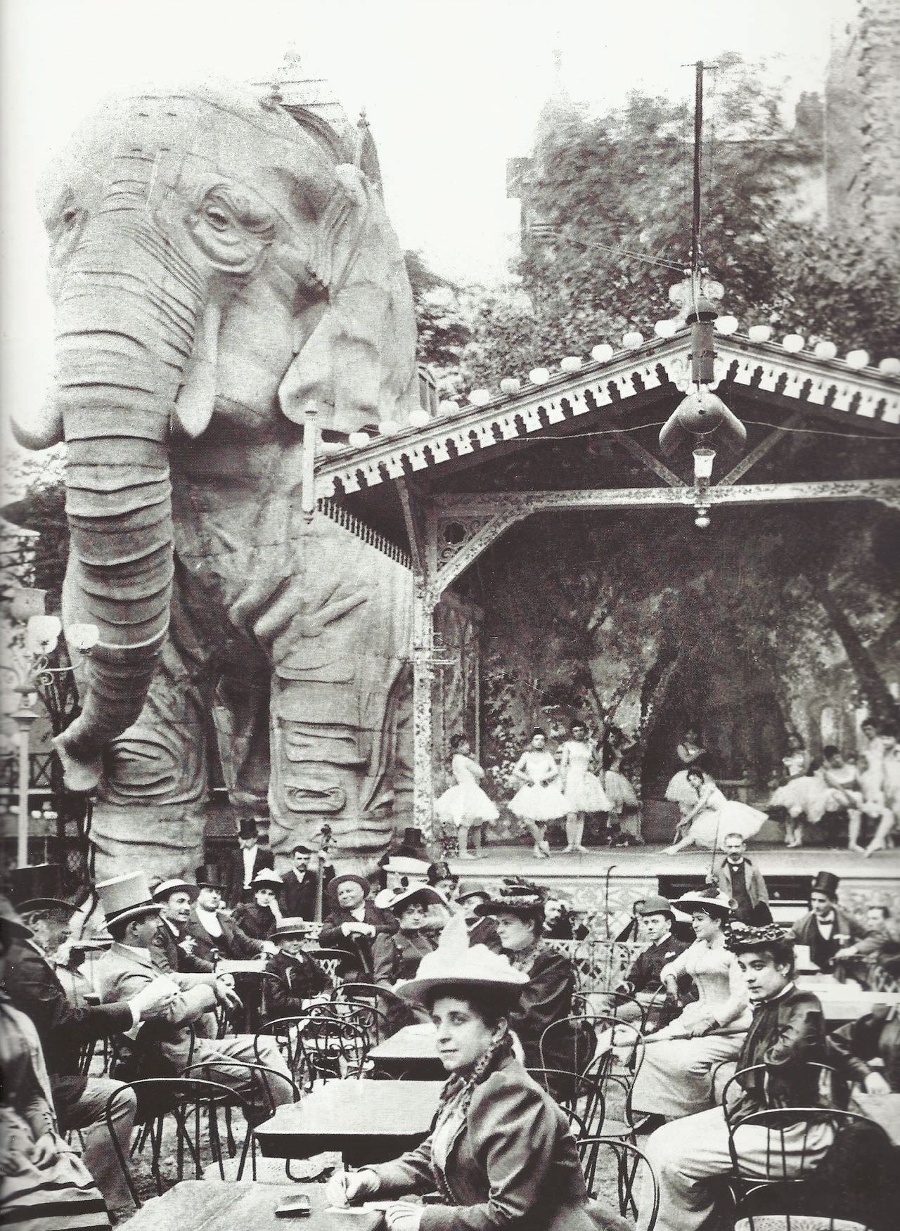 A giant elephant statue overlooks the gardens of Moulin Rouge in Paris, France in 1901.