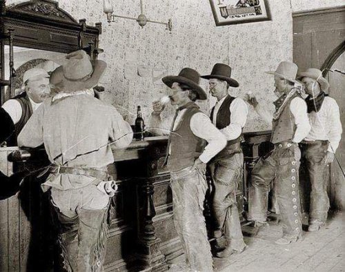 Cowboys drinking at a saloon in Tascosa, Texas 1907