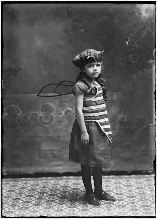 A child dressed up as a bee in the US in 1898.