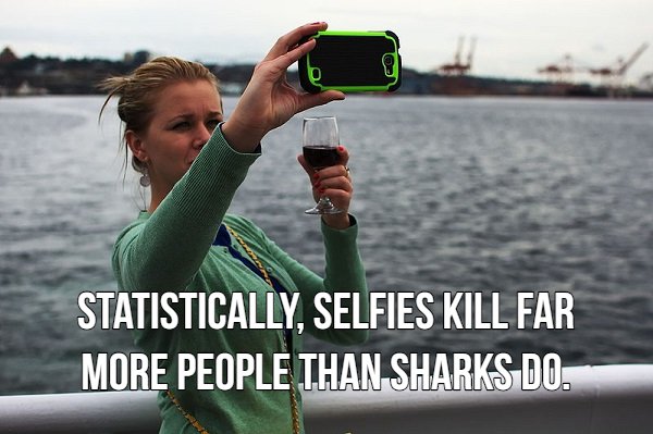 selfie takers - Statistically, Selfies Kill Far More People Than Sharks Do.