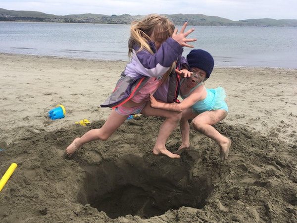 perfectly timed photos - little girl at beach bottomless