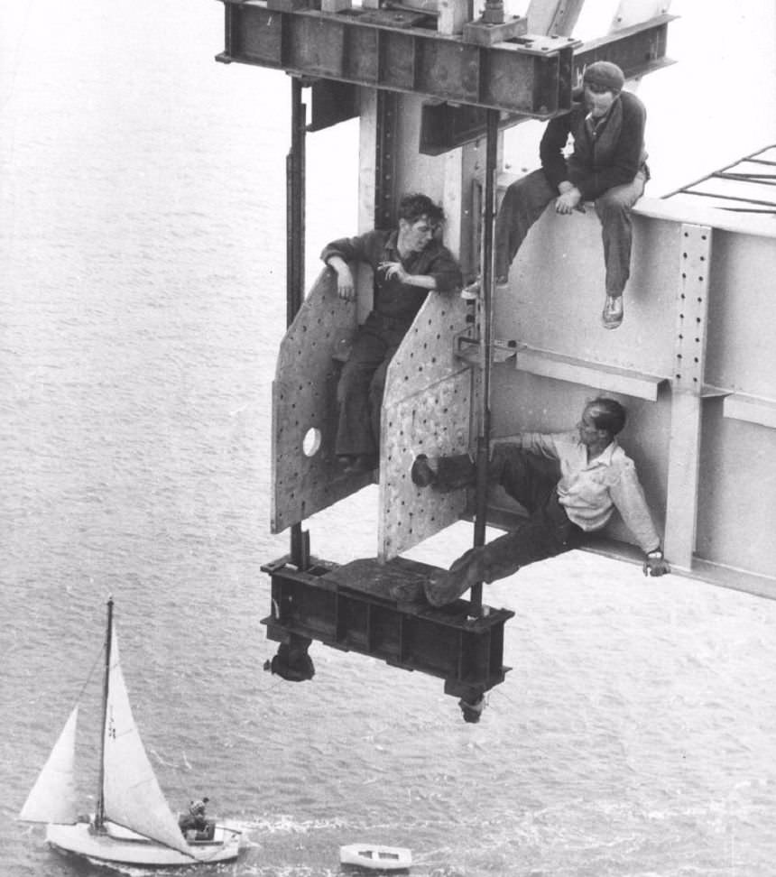 Auckland Harbour Bridge workers taking a break in Auckland, New Zealand in 1955.