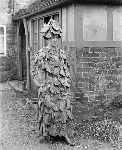 A woman wearing cabbage, yes cabbage, as a costume in the US in 1909.