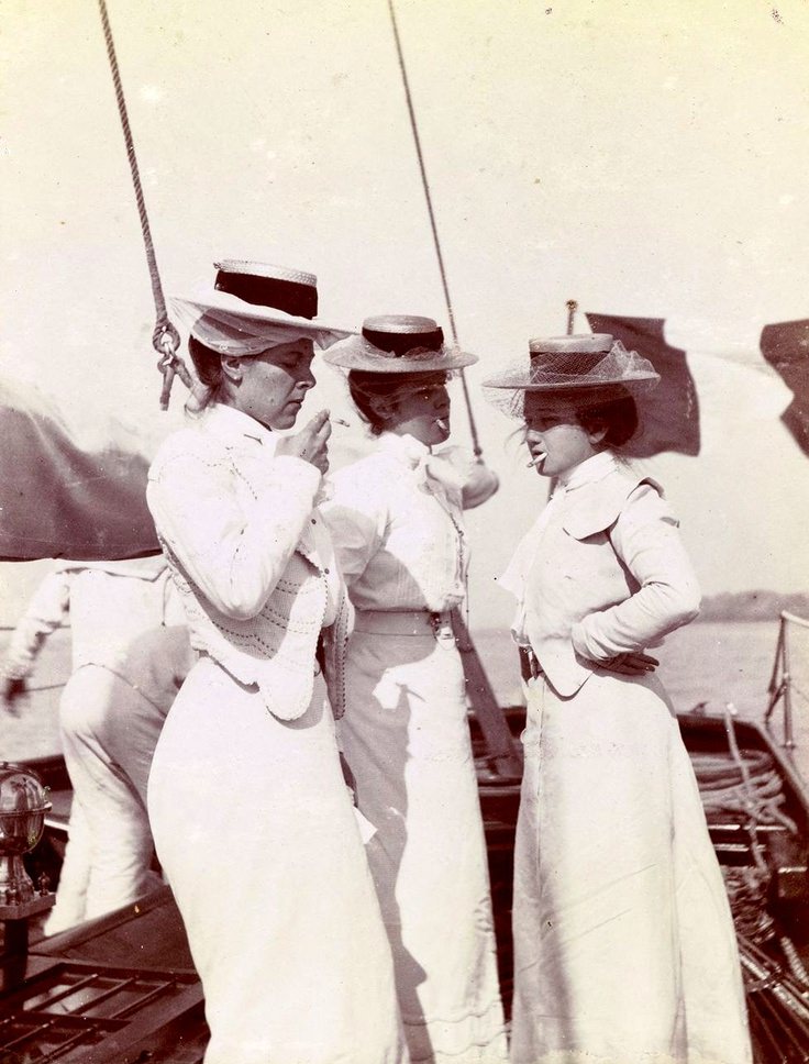 Women smoking on a boat off the coast of Normandy, France in 1908.