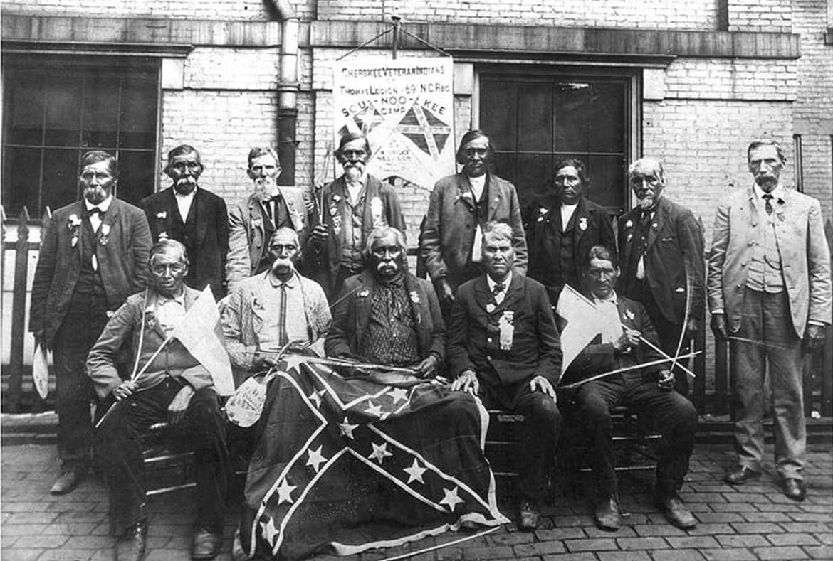 Cherokee Indians who fought with the Confederates pose with fellow soldiers during a reunion in New Orleans, US in 1903.