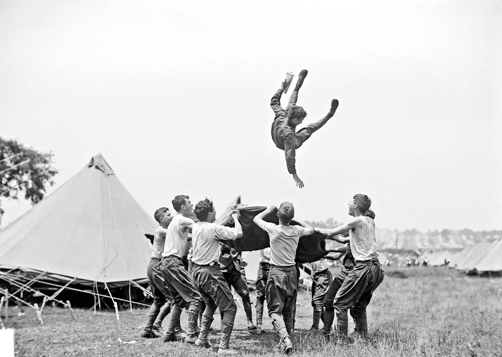 Boy Scouts having some fun at the Battle of Gettysburg reunion at the battlegrounds in Pennsylvania, US in 1913.