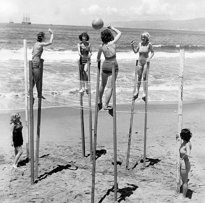 Playing volleyball on stilts at Venice Beach in California, US in 1953.