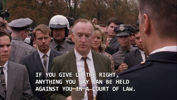 In The Shawshank Redemption (1994), the DA who arrests the sadistic Captain Hadley can be seen reading the Miranda rights off of a card. The scene is set in 1966, the same year that Miranda v. Arizona court case made the act mandatory when arresting a suspect.