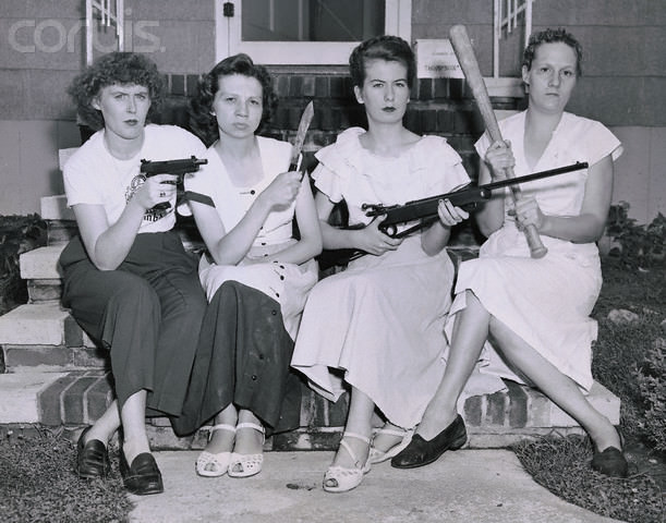 4 Women pose for a picture in Maryland, US in 1950. They were showing off the weapons they used to round up 4 men who had been terrorizing the neighborhood for 3 weeks. They shot at the men, chased them down, forced them to surrender, and then waited for the police to arrive.