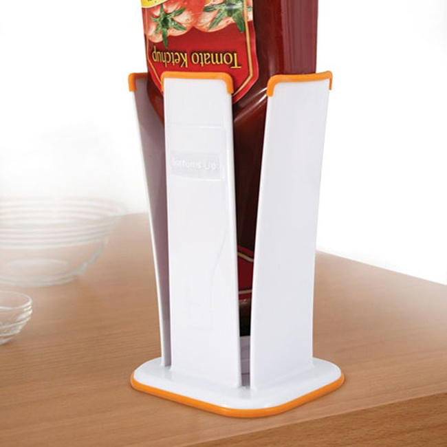 An upside-down ketchup bottle holder