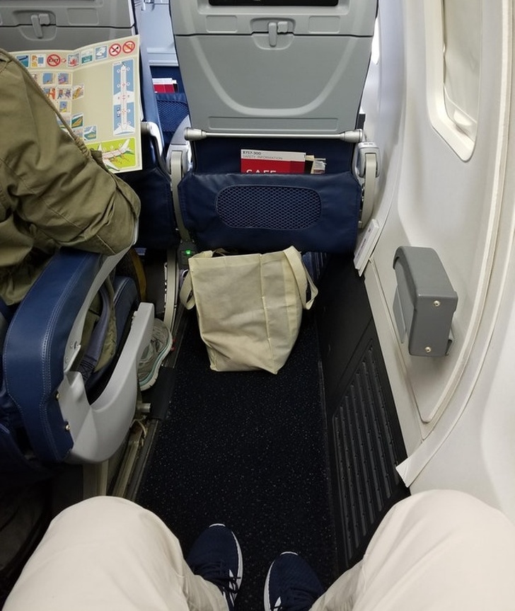 “The plane seat in front of me was removed, giving me an abnormal amount of leg room for an economy class seat.”