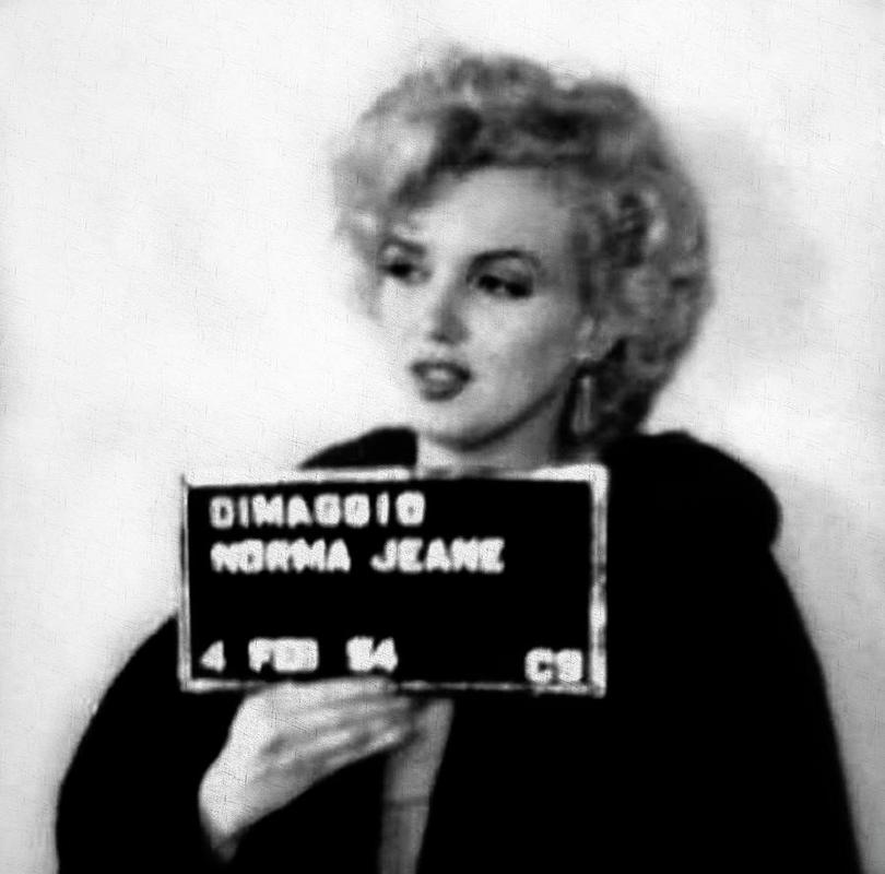 Marilyn Monroe’s mugshot, after being arrested for driving too slow and without a license. (1954)