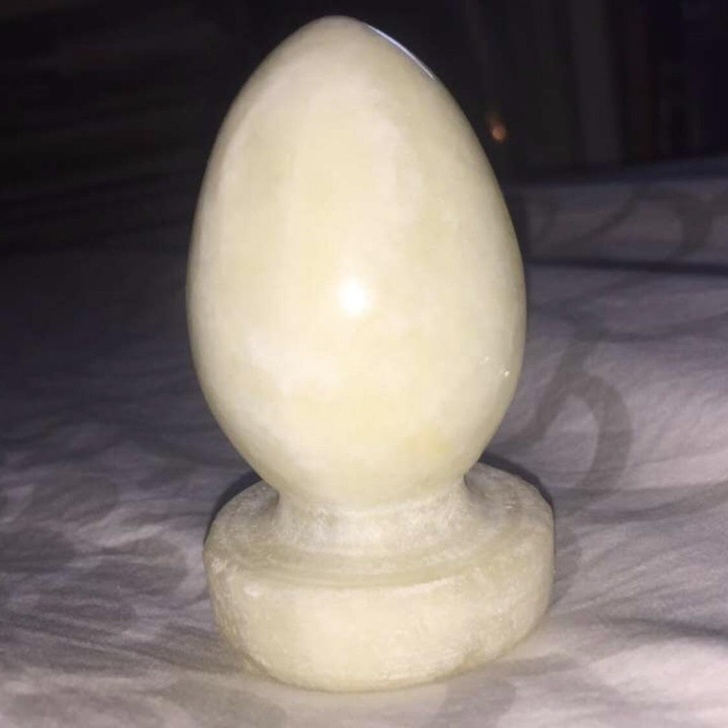 “A small marble-like object, sitting on a desk at my grandparents’ house and it fits in my hand. I never knew what this marble egg was for.” It’s a paperweight — a heavy thing made of bronze, marble, or glass, placed on top of papers to keep them from getting blown away or to keep the sheet from moving. Could also be an antique sex toy... of the plug variety.