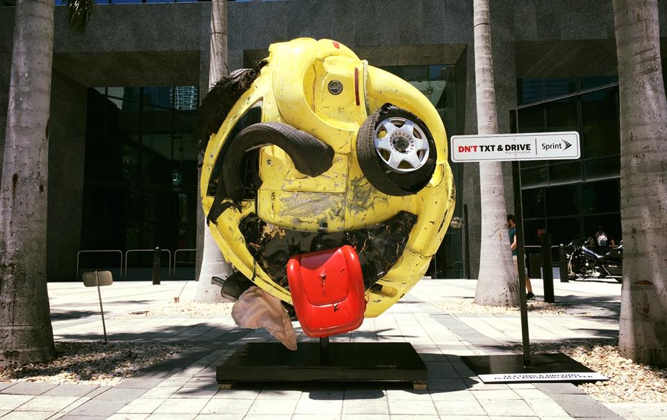 Artist Rudolf Kohn, transformed a mangled car into an emoji as an anti texting & driving PSA