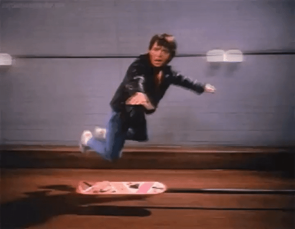 Michael J. Fox clowning around while filming the hoverboard-in-the-tunnel scene for Back to the Future 2, 1989.