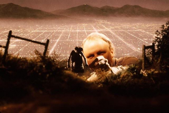 Dennis Muren prepping miniature on a set for E.T. the Extra-Terrestrial, 1982.