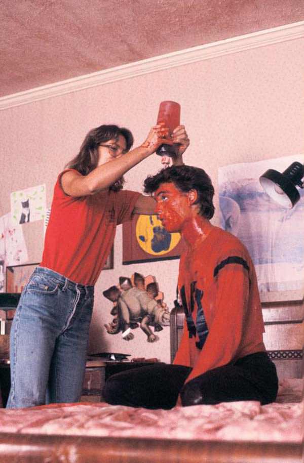 Johnny Depp getting covered blood for his big scene in A Nightmare on Elm Street, 1984.