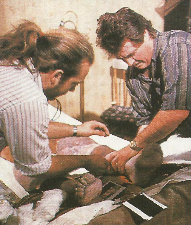 Special make up FX artists Greg Nicotero and Howard Berger setting up Paul Sheldon's foot prosthetics for "that scene" on the set of Misery, 1990.