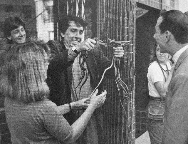 Tim Burton demonstrating what he wants the snake rescue scene to look like to Paul Reubens on the set of Pee Wee's Big Adventure, 1985. So, so young.